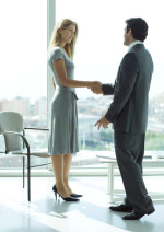 Lady and Man shaking hands